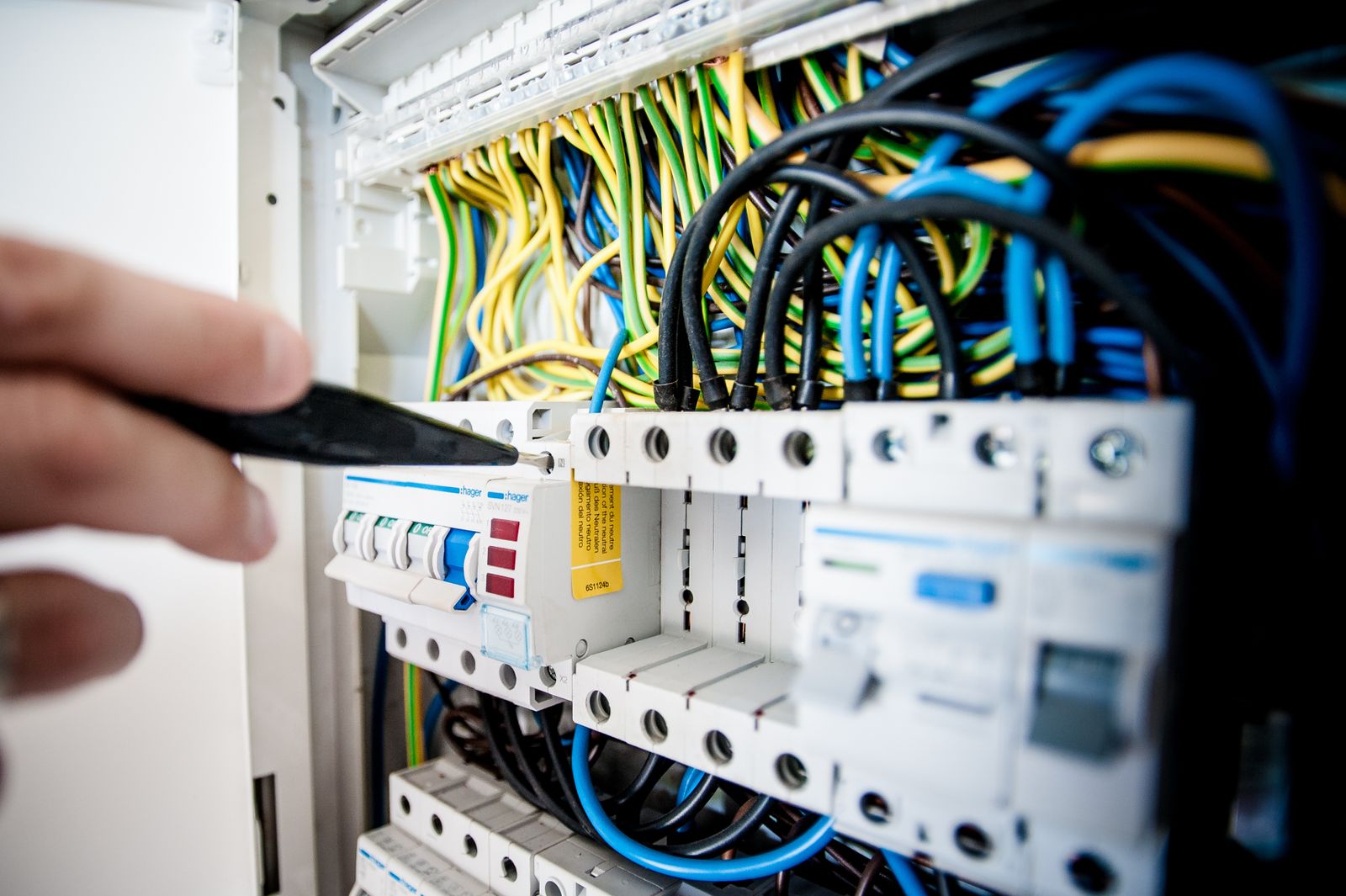Placeholder stock photo — electrician at work